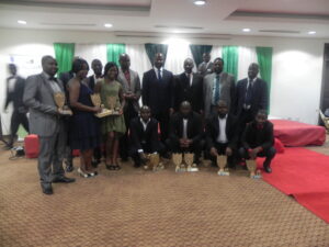 award winners pose with the Minister