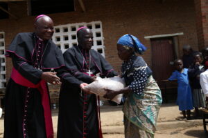 Bishop Msusa & Mtumbuka presenting a symbolic donation