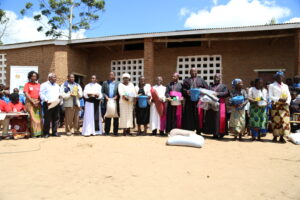 Bishops take a group photo with selected flood vbeneficiaries,government officials and traditional leaders