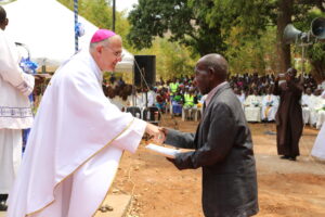 A Mr. Simango who was present when the Seminary was being built receiving a cirtificate from the Nuncio